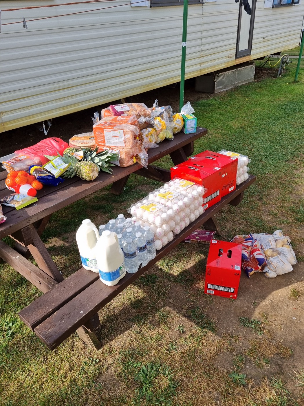 Groceries by the caravan — workers shop together and cook for themselves